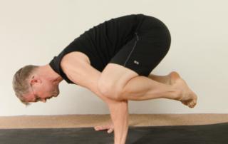 Learn to practice arm balances without neck tension